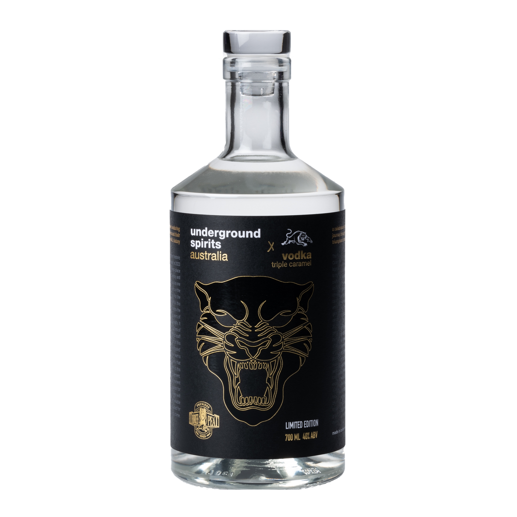 Image of a clear bottle filled with transparent vodka, featuring a striking black label with the face of a panther depicted in bold detail. The label commemorates The Panthers' consecutive victories in 2021, 2022, and 2023, celebrating their triple championship. The bottle exemplifies a sleek and modern design, tailored for collectors and sports enthusiasts